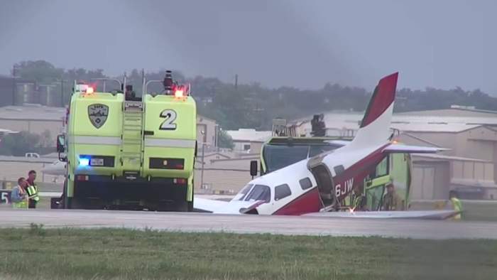 Private plane veers off runway at San Antonio International Airport after nose gear collapse; no injuries reported