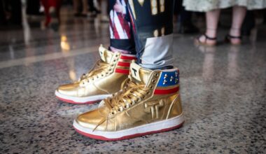 A woman wears gold shoes during the Republican convention at the American Airlines Center in Dallas, Wednesday, Sept. 9, 2026.