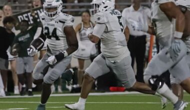 Waxahachie High School defensive end Javon Moore (24) picks up a host of blockers to escort him to the end zone and put the game well out of reach during the second half as Denton Guyer High School hosted Waxahachie High School in a nondistrict football game at the C.H. Collins Complex in Denton on Thursday, September. 10, 2026.