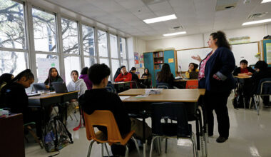 Julie Harris teaches a personal financial literacy and economics class at Skyline High School in March in Dallas.