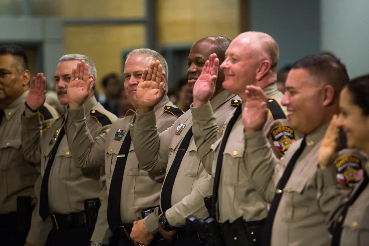 Travis County Sheriff's Office command staff taking the oath of office in 2017. When asked if THCA concentrates containing no more than 0.3% Delta-9 THC were legal or a felony to possess, the Sheriff's Office said 'every instance is unique.'