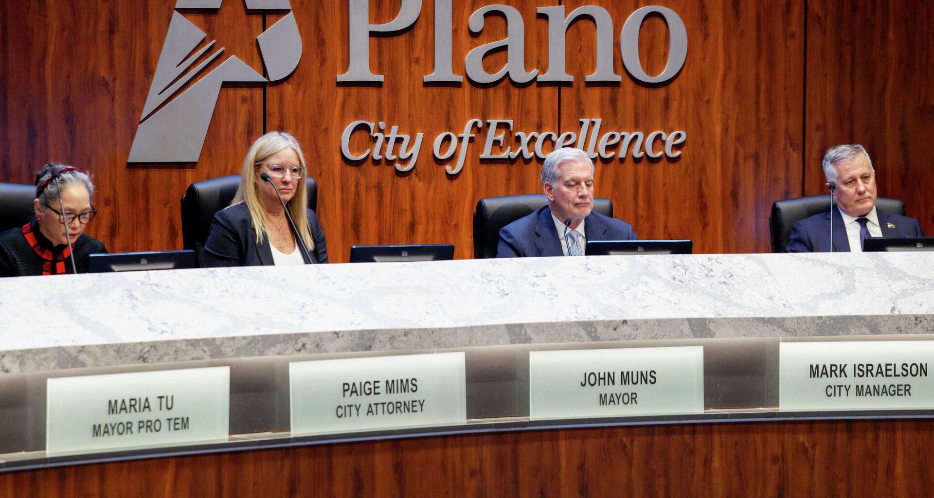 Plano Mayor John Muns and council members vote during a Plano City Council meeting, Monday, Feb. 23, 2026, in Plano.