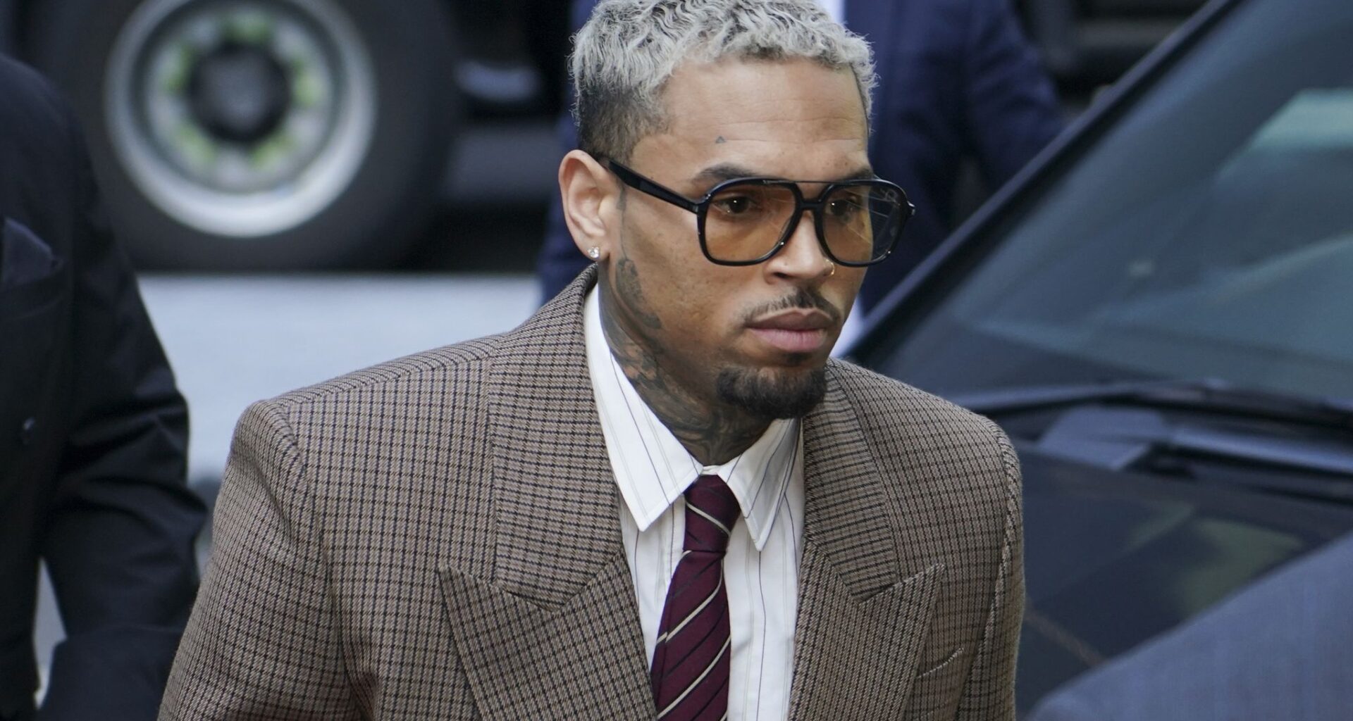 Grammy-winning singer Chris Brown makes his way into Southwark Crown Court, in London, Friday, July 11, 2025.(AP Photo/Alberto Pezzali)