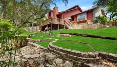 This house for sale on San Antonio's greenbelt has a workshop treehouse