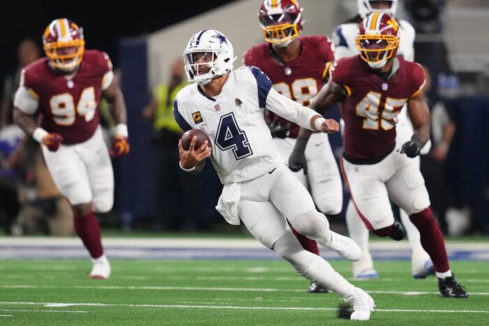 Prescott throws 4 TD passes as Cowboys beat Commanders, who again lose Daniels to dislocated elbow