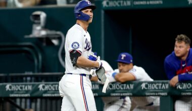 Texas Rangers pitcher Jacob Latz (left) celebrates with left fielder Wyatt Langford after the final out of a 6-2 victory over the Toronto Blue Jays in a baseball game at Globe Life Field on Saturday, Sept. 19, 2026, in Arlington.