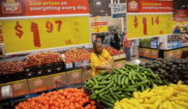 Mill City resident Linda Belt prepares food for another costumer while Robert Walker eats French fries at the Fair Park Grocery on Lagow Street near Metropolitan Avenue on Nov. 14, 2025, in Dallas.