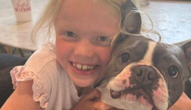 Eloise “Lulu” Peck with her grandparent's dog Henry in a toy Porsche. Lulu was named the ASPCA’s 2026 Kid of the Year. The honor will be accepted posthumously after her death at age 8 in the July 2025 flooding near Camp Mystic.