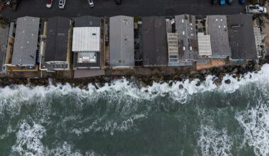 Sea level rise is reshaping a California beach town and threatening a key rail line
