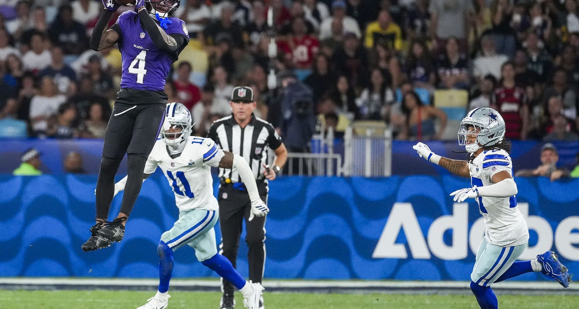 Baltimore Ravens kicker Tyler Loop (33) celebrates with safety Kyle Hamilton (14) and cornerback Marlon Humphrey (44) after kicking a 56 yard field game-winning field goal on the final play of a victory over the Dallas Cowboys in an NFL football game at Maracanã Stadium on Sunday, Sept. 27, 2026, in Rio de Janeiro, Brazil.