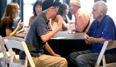 Tom Huang, left, Assistant Managing Editor for Journalism Initiatives at The Dallas Morning News, speaks to Wayne Gary, during a Dallas Morning News pop-up newsroom at Urban Rio in downtown Plano, Texas, Monday, September 28, 2026.