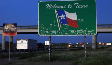 Trucks pass the ‘Welcome to Texas’ highway sign on eastbound Interstate 40 at the New Mexico state border, July 21, 2026.