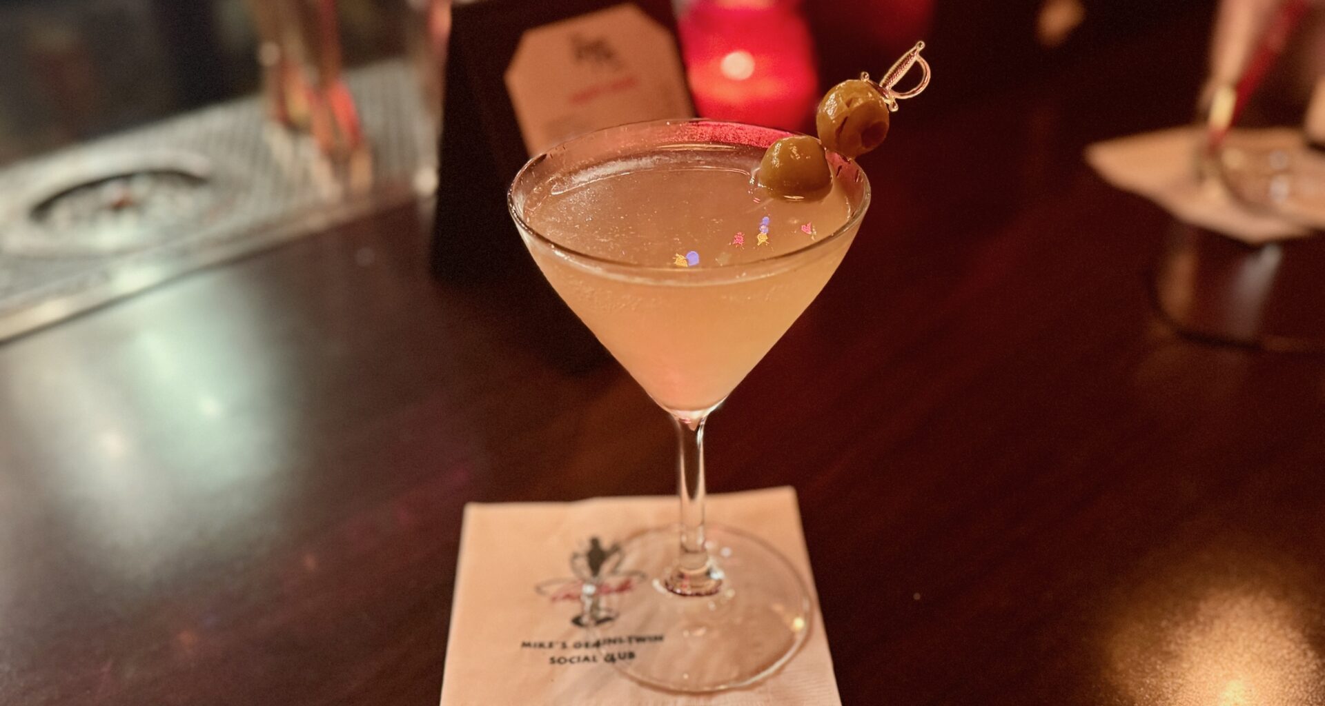 a dirty martini on a bar