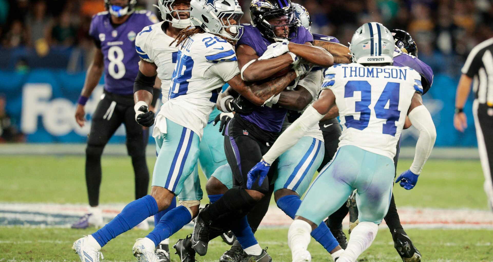Football - NFL - Baltimore Ravens v Dallas Cowboys - Estadio Maracana, Rio de Janeiro, Brazil - September 27, 2026 Baltimore Ravens' Justice Hill in action with Dallas Cowboys' Shavon Revel Jr.