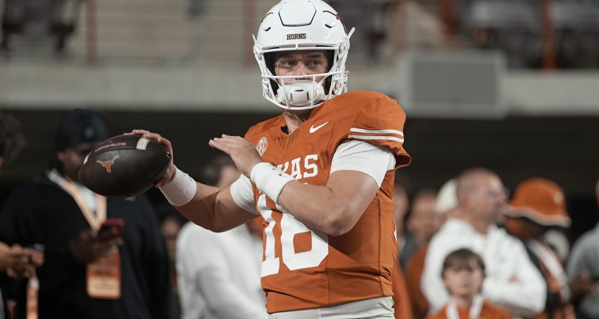 Nov 28, 2025; Austin, Texas, USA; Texas Longhorns quarterback Arch Manning warms up before a game against the Texas A&M Aggies at Darrell K Royal-Texas Memorial Stadium. Mandatory Credit: Scott Wachter-Imagn Images