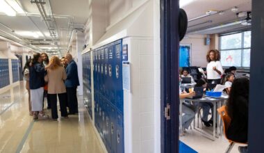 State-appointed HISD Superintendent Mike Miles huddles with Fonville Middle School administrators after observing seventh grade teacher Ashlie Flores teach her students on Wednesday, Aug. 26, 2026. Texas’ top officials want to use Miles’ school reform effort as a blueprint for Texas public schools.