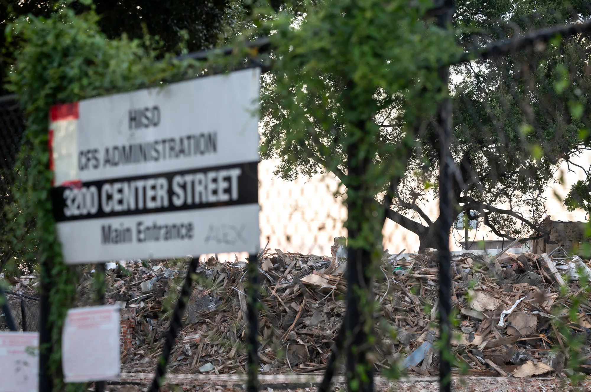 Piles of debris are all that remain of the Harper School in Houston, a 99-year-old structure built to serve Black students during segregation on Sept. 16, 2026. Parents protested the sale of the historic building, which caught on fire and is being demolished after it was handed over to a private company.