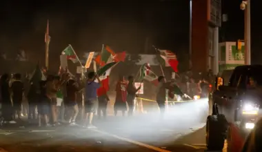 Protesters block part of Research Boulevard under U.S. 183 after an ICE officer shot and wounded 28-year-old Wilber Rafael Garces Perez on Sunday, Sept. 20, 2026, in North Austin.