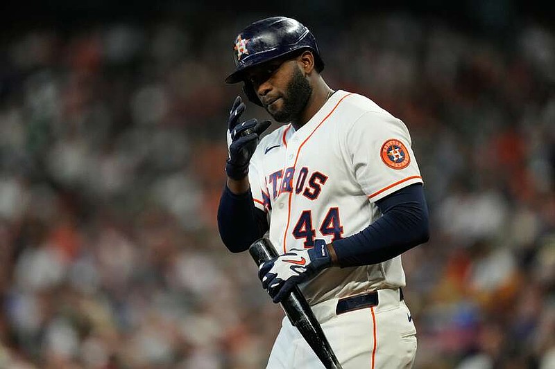 Houston Astros designated hitter Yordan Alvarez greets the Toronto Blue Jays dugout as he walks up to bat during the first inning of a baseball game in Houston, Wednesday, Aug. 5, 2026. (AP Photo/Ashley Landis)