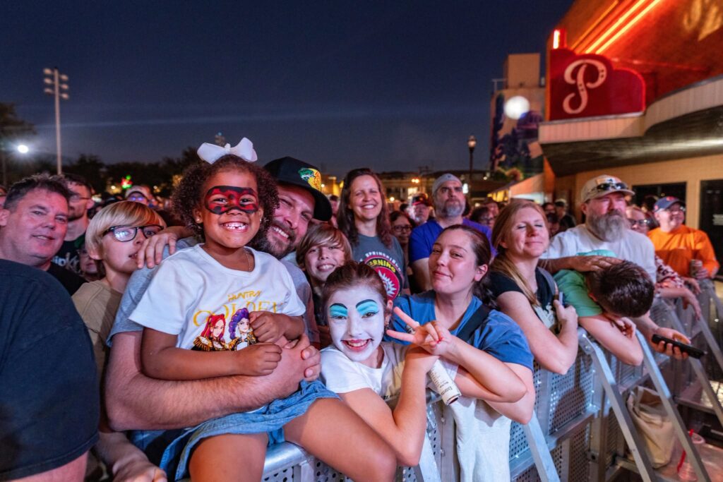 Festival goers enjoy rides, food, games and live music by Deep Blue Something and the Wallflowers at the 14th annual Festival at the Switchyard Saturday, Nov. 8, 2025, in downtown Carrollton, Texas.