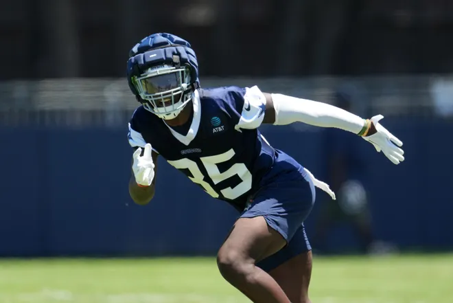 Jul 27, 2023; Oxnard, CA, USA; Dallas Cowboys linebacker DeMarvion Overshown (35) wears a Guardian helmet cap during training camp at Marriott Residence Inn-River Ridge Playing Fields. Mandatory Credit: Kirby Lee-USA TODAY Sports