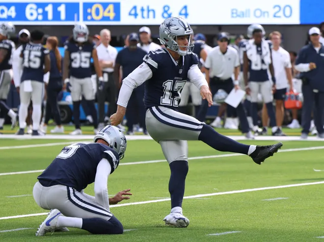 INGLEWOOD, CALIFORNIA - AUGUST 11: Brandon Aubrey #17 of the Dallas Cowboys watches his field goal with Bryan Anger #5, to take a 12-6 lead over the Los Angeles Rams, in a 13-12 Rams win during a preseason game at SoFi Stadium on August 11, 2024 in Inglewood, California. (Photo by Harry How/Getty Images)