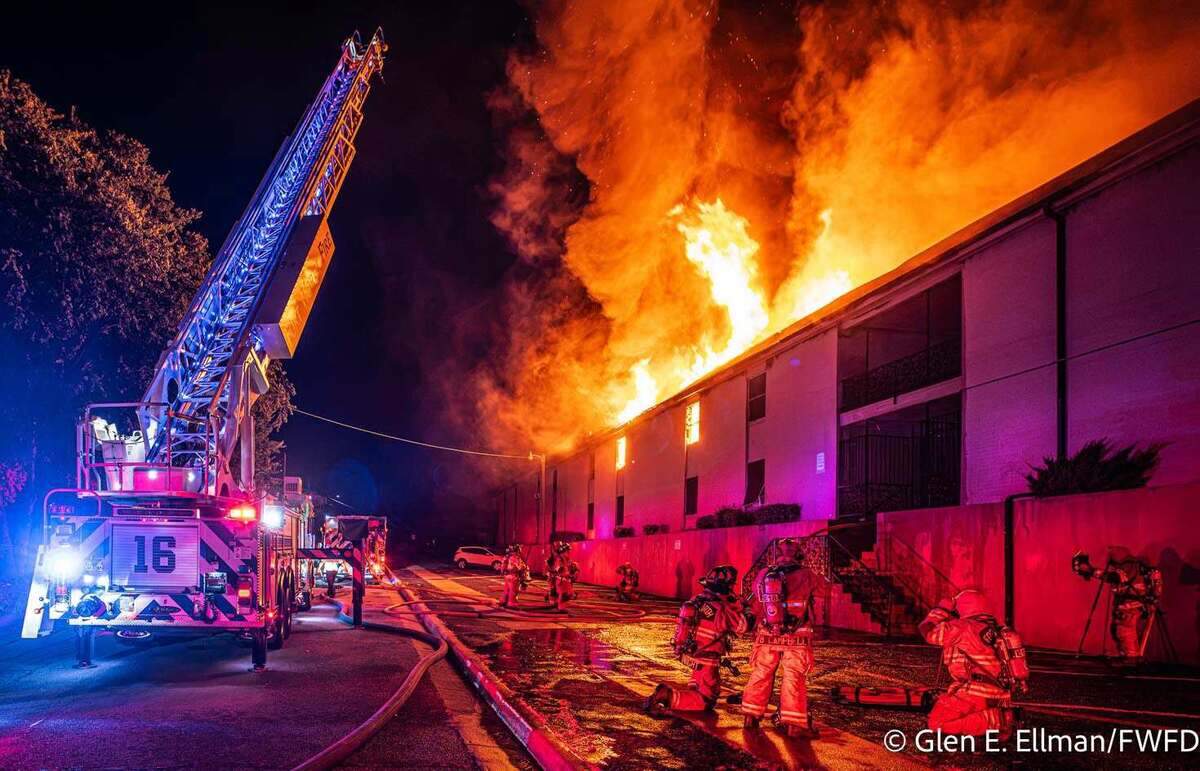 Fort Worth firefighters battle a fire at the Mariposa Park Apartments, at 6701 Calmont Ave.