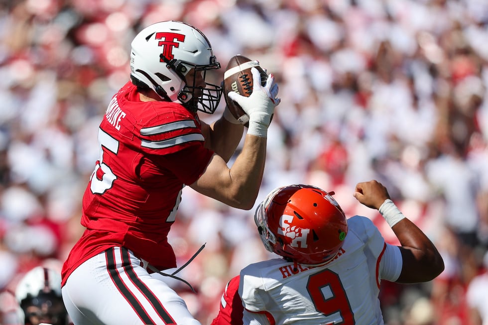 Texas Tech linebacker Austin Romaine (15) intercepts pass over Sam Houston State's Brett...