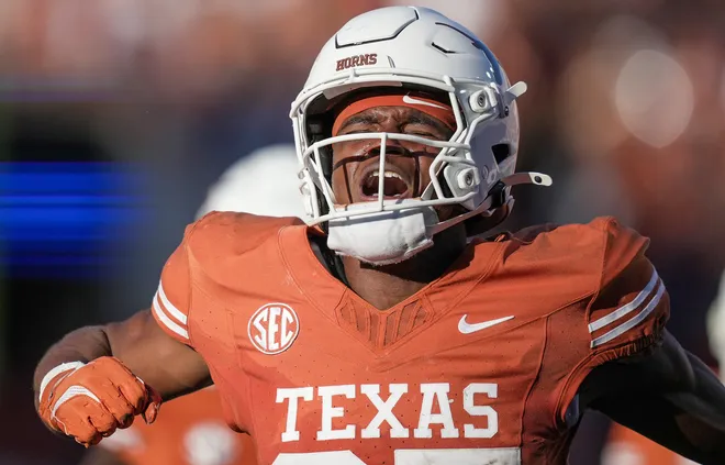 Nov 23, 2024; Austin, Texas, USA; Texas Longhorns defensive back Jelani McDonald (25) celebrates after a turnover against the Kentucky Wildcats in the second quarter during the first half at Darrell K Royal Texas Memorial Stadium. Mandatory Credit: Ricardo B. Brazziell/USA TODAY Network
