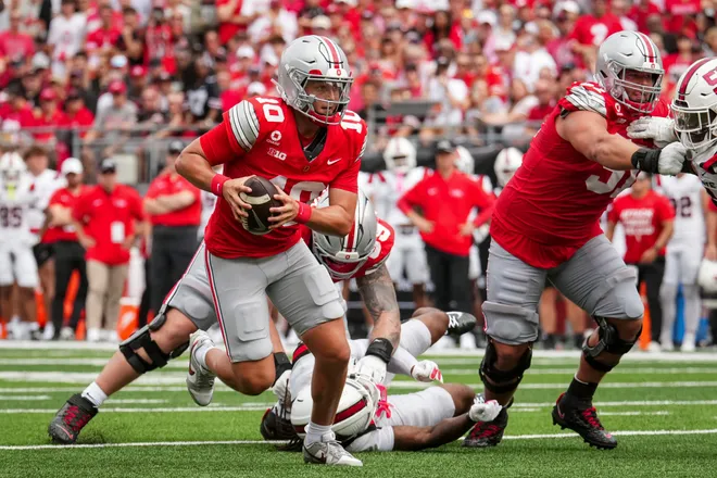 Ohio State Buckeyes quarterback Julian Sayin (10) runs for a touchdown during the NCAA football game against the Ball State Cardinals at Ohio Stadium in Columbus on Sept. 5, 2026.