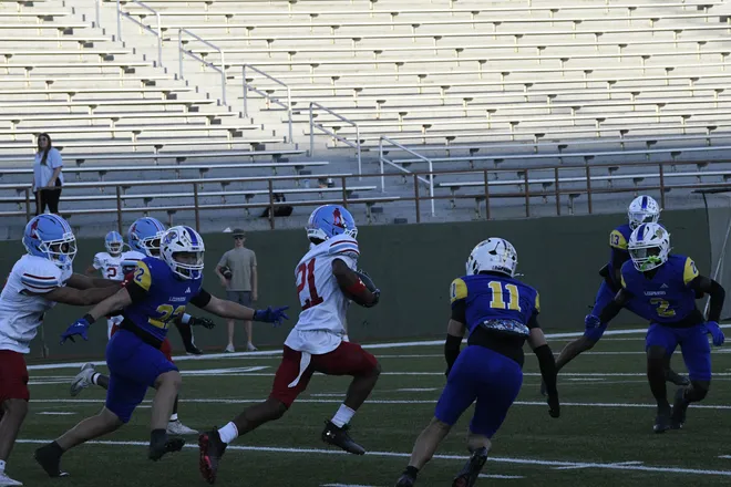 Oryan Jackson runs the ball for Lubbock Monterey during a game against Legacy High School on Friday, Sept. 11, 2026.