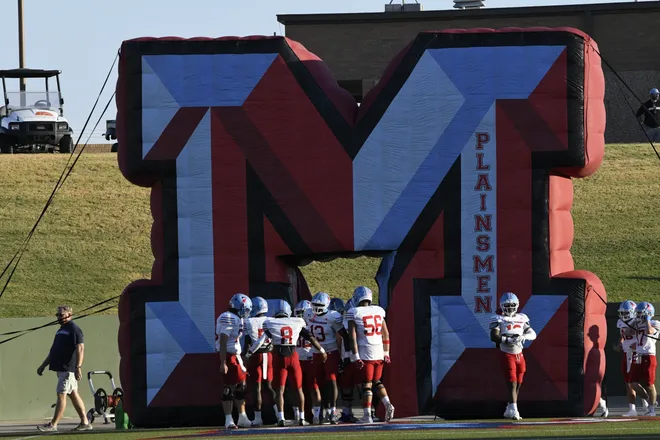 Lubbock Monterey prepares to run out of its tunnel before a game against Legacy High School on Friday, Sept. 11, 2026.
