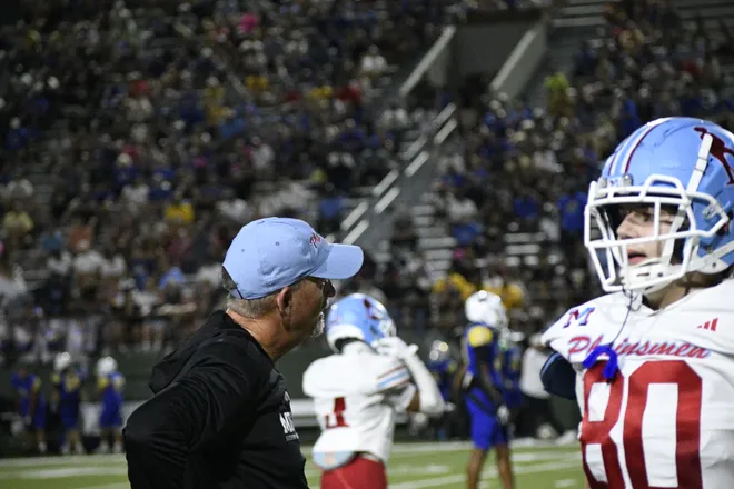 Lubbock Monterey head coach Jason Sims yells at his team during Legacy football's 42-14 homecoming win over the Plainsmen on Friday, Sept. 11, 2026.
