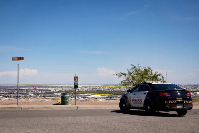 An El Paso police vehicle blocks a road near Tom Lea Park during the investigation of a shooting in West El Paso on Saturday, Sept. 12, 2026.
