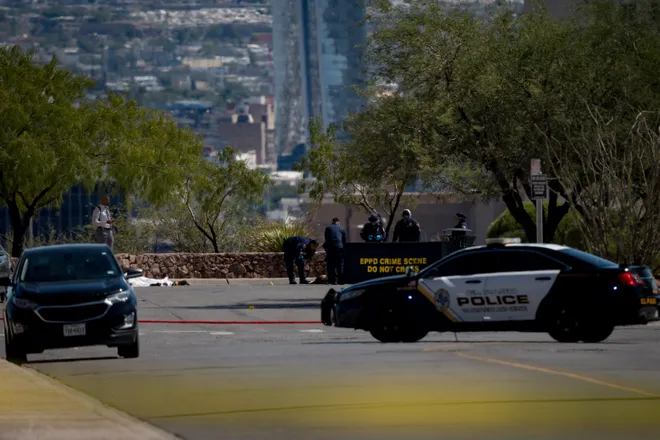 El Paso police officers examine the scene of a shooting at Tom Lea Park in West El Paso on Saturday, Sept. 12, 2026.”