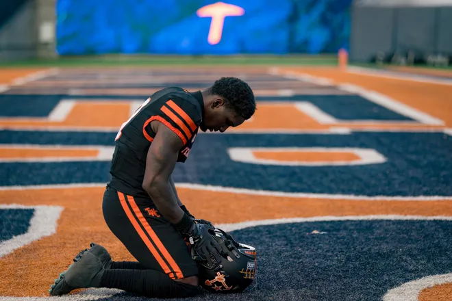 UTEP’s Jaden Smith kneels takes a moment before the football home opener against Texas Southern on Saturday, Sept. 12, 2026, at Sun Bowl Stadium in El Paso, Texas.
