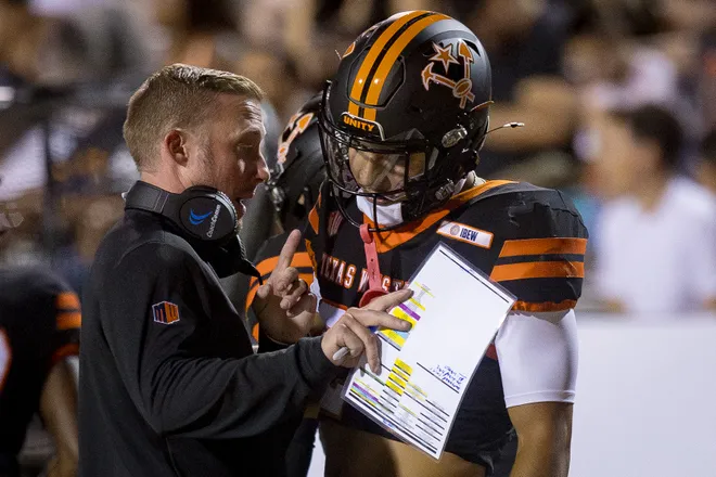UTEP’s head football coach Scotty Walden talks to Jaime Guerrero during the football home opener against Texas Southern on Saturday, Sept. 12, 2026, at Sun Bowl Stadium in El Paso, Texas.