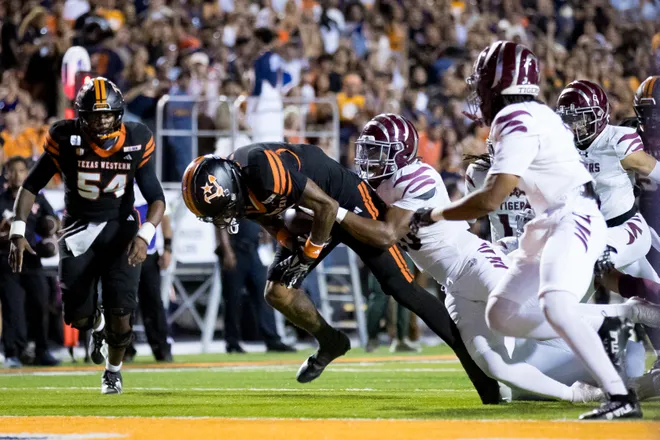 UTEP’s Carver Cheeks dives into the end zone for a touchdown during the football home opener against Texas Southern on Saturday, Sept. 12, 2026, at Sun Bowl Stadium in El Paso, Texas.