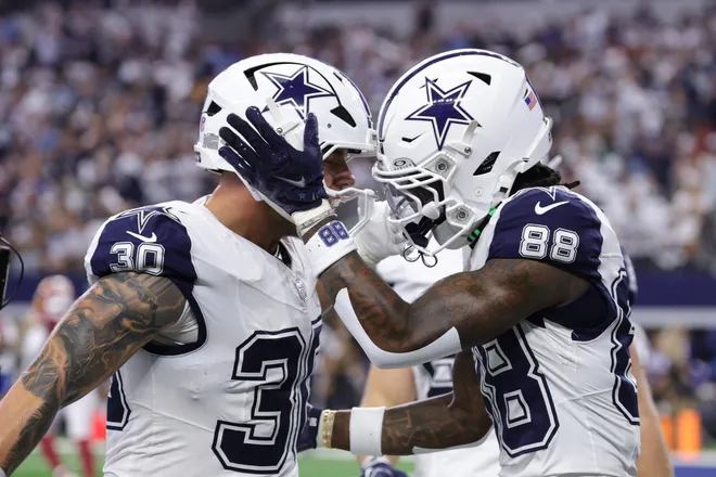 Sep 20, 2026; Arlington, Texas, USA; Dallas Cowboys wide receiver CeeDee Lamb (88) celebrates fullback Hunter Luepke (30) after catching a three-yard touchdown pass thrown by quarterback Dak Prescott (not pictured) against the Washington Commanders during the first quarter at AT & T Stadium. Mandatory Credit: Kevin Jairaj-Imagn Images