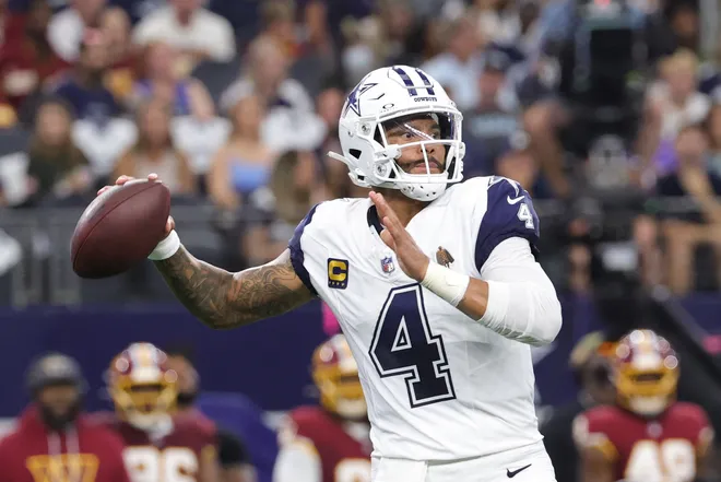 Sep 20, 2026; Arlington, Texas, USA; Dallas Cowboys quarterback Dak Prescott (4) drops back to pass against the Washington Commanders during the first quarter at AT & T Stadium. Mandatory Credit: Kevin Jairaj-Imagn Images