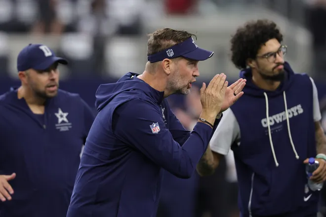 Sep 20, 2026; Arlington, Texas, USA; Dallas Cowboys head coach Brian Schottenheimer instructs his team before a game against the Washington Commanders at AT & T Stadium. Mandatory Credit: Kevin Jairaj-Imagn Images