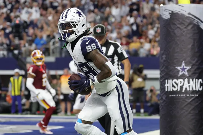 Sep 20, 2026; Arlington, Texas, USA; Dallas Cowboys wide receiver CeeDee Lamb (88) reacts after catching a three-yard touchdown pass thrown by quarterback Dak Prescott (not pictured) against the Washington Commanders during the first quarter at AT & T Stadium. Mandatory Credit: Kevin Jairaj-Imagn Images