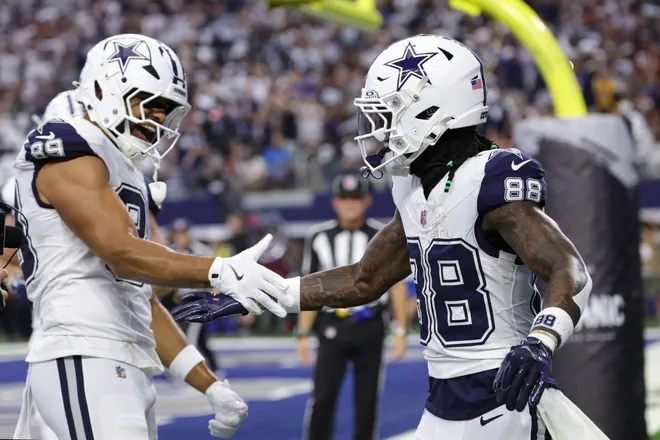Sep 20, 2026; Arlington, Texas, USA; Dallas Cowboys wide receiver CeeDee Lamb (88) celebrates with tight end Brevyn Spann-Ford (89) after catching a three-yard touchdown pass thrown by quarterback Dak Prescott (not pictured) against the Washington Commanders during the first quarter at AT & T Stadium. Mandatory Credit: Kevin Jairaj-Imagn Images