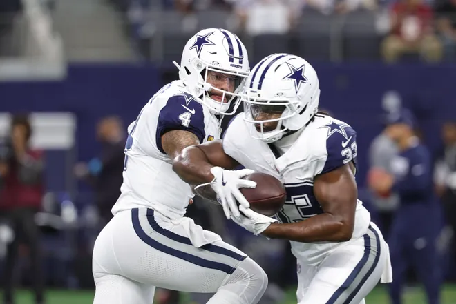 Sep 20, 2026; Arlington, Texas, USA; Dallas Cowboys quarterback Dak Prescott (4) hands the ball to running back Javonte Williams (33) during warmups before a game against the Washington Commanders at AT & T Stadium. Mandatory Credit: Kevin Jairaj-Imagn Images