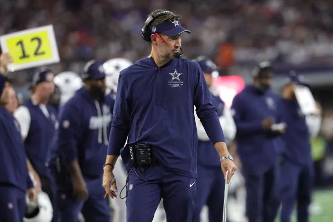 Sep 20, 2026; Arlington, Texas, USA; Dallas Cowboys head coach Brian Schottenheimer watches game play against the Washington Commanders during the second half at AT & T Stadium. Mandatory Credit: Kevin Jairaj-Imagn Images