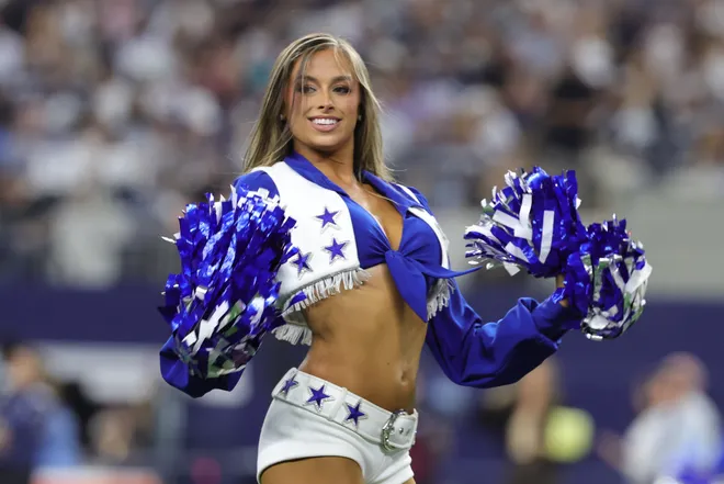 Sep 20, 2026; Arlington, Texas, USA; A Dallas Cowboys Cheerleader performs during the second half of a game against the Washington Commanders at AT & T Stadium. Mandatory Credit: Kevin Jairaj-Imagn Images