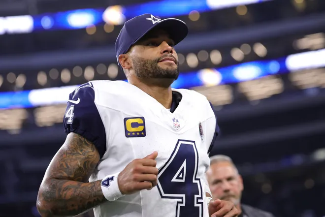 Sep 20, 2026; Arlington, Texas, USA; Dallas Cowboys quarterback Dak Prescott (4) jogs off the field after a game against the Washington Commanders at AT & T Stadium. Mandatory Credit: Kevin Jairaj-Imagn Images