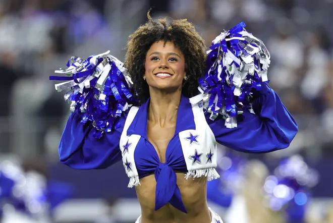 Sep 20, 2026; Arlington, Texas, USA; A Dallas Cowboys Cheerleader performs during the second half of a game against the Washington Commanders at AT & T Stadium. Mandatory Credit: Kevin Jairaj-Imagn Images