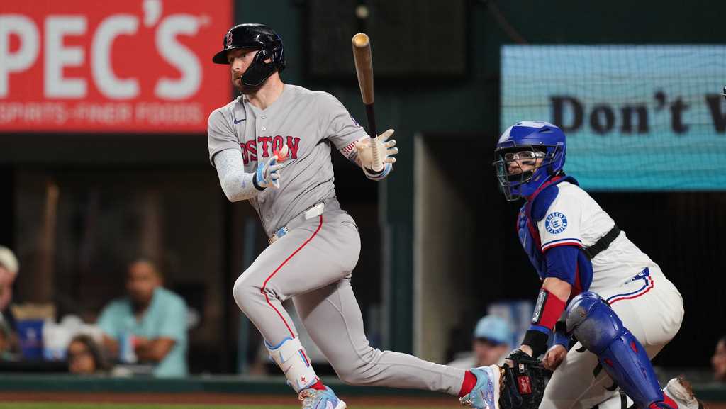 Texas Rangers beat the Boston Red Sox 7-3 on Wednesday night to pull even with Houston atop the AL West