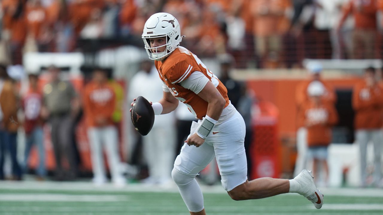 Texas quarterback Arch Manning (16) runs as he looks to throw against Vanderbilt during the first half of an NCAA college football game in Austin, Texas, Saturday, Nov. 1, 2025. (AP Photo/Eric Gay)